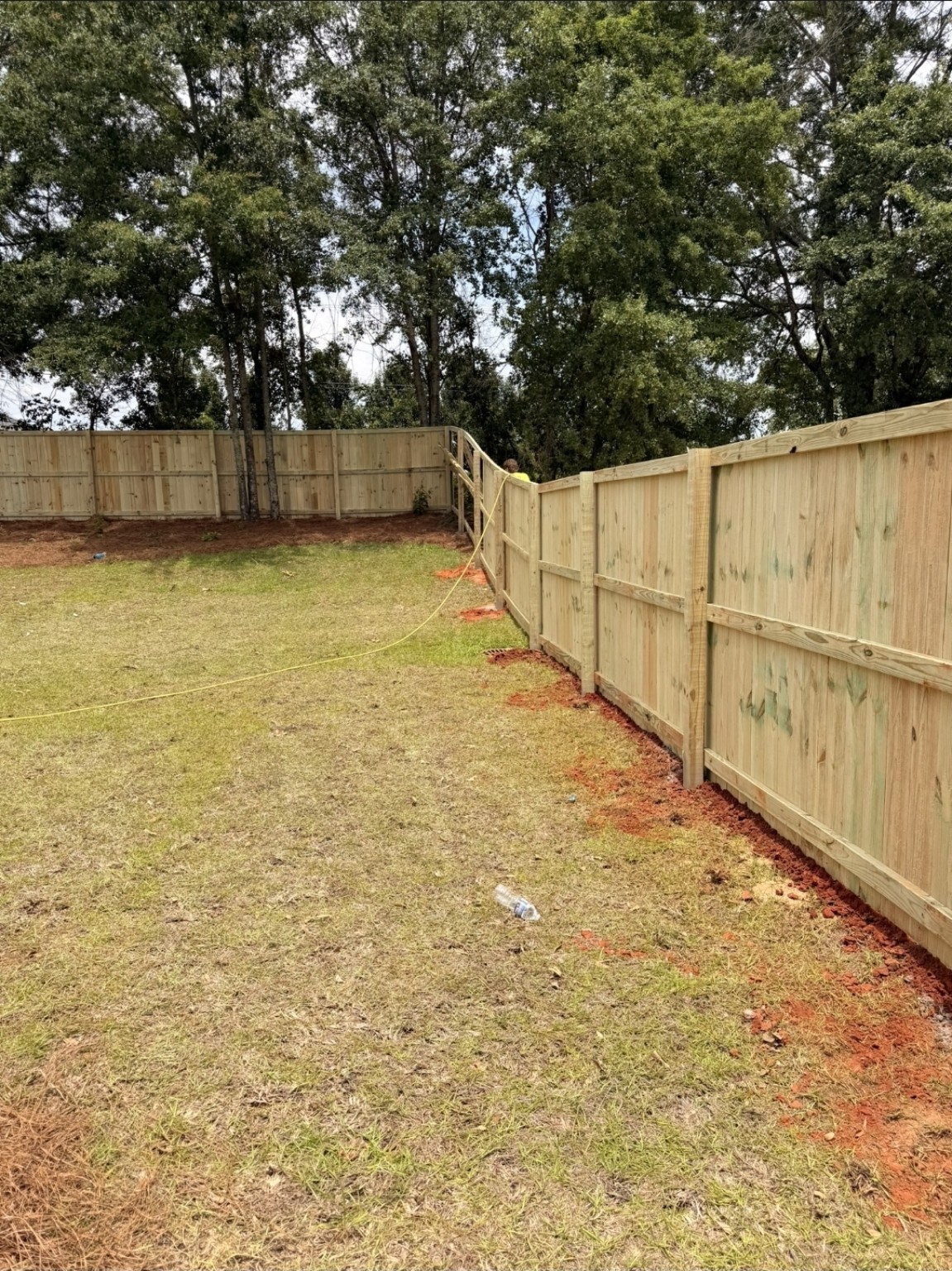 Newly installed wood privacy fencing